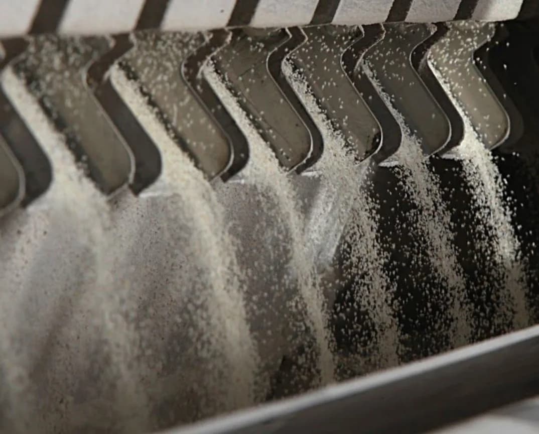 Flour passing through a roller mill