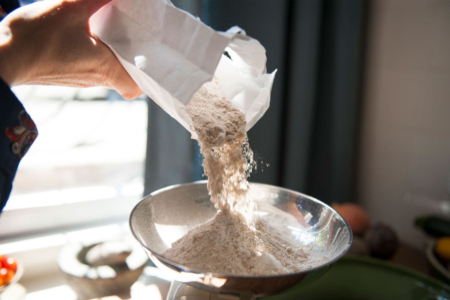 A TrueBatch miller running customer grain through the stone mill in Jakkur